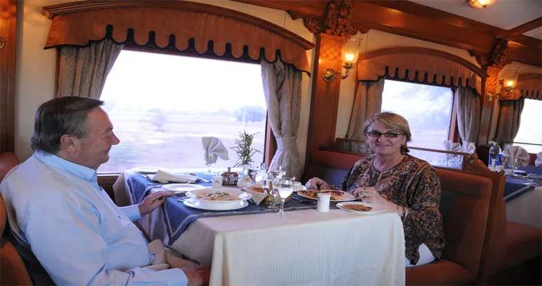 Tourist at Maharaja Express Luxury Train Restaurant Image